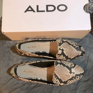 Brand new, never worn Aldo Animal print Flats.